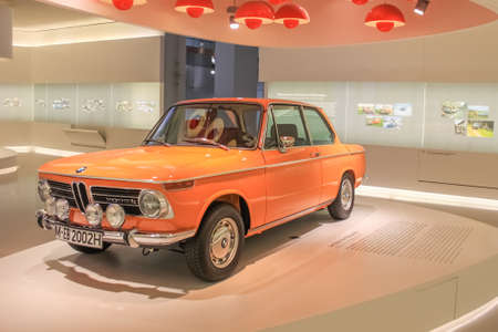 Germany, Munich - April 27, 2011: BMW 2002 TI coupe in the exhibition hall of the BMW Museum. The car was produced from 1968 to 1976のeditorial素材