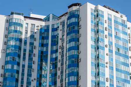 Krasnodar, Krasnodar Territory, Russia, June 11, 2021: Modern multi-storey residential building hung...