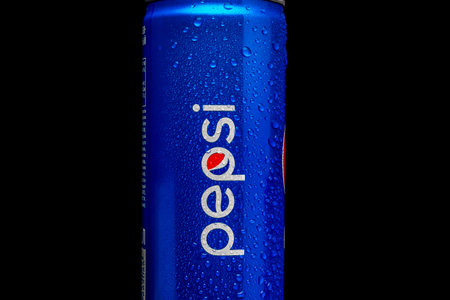 Cold can of Pepsi with water droplets isolated on black background. Russia, Krasnodar, December 15,...
