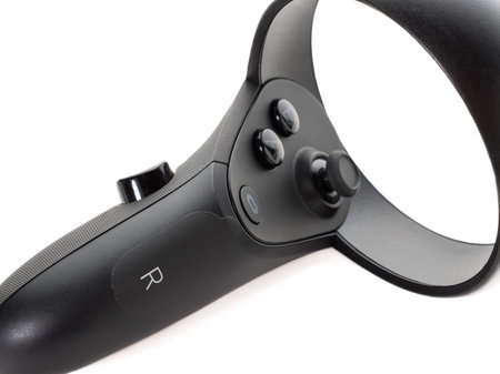 Close-up of the joystick from the VR helmet isolated on a white background. The right controller...