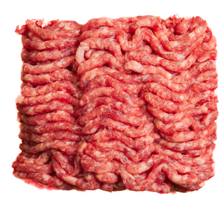 Briquette of raw ground beef isolated on a white background. top view