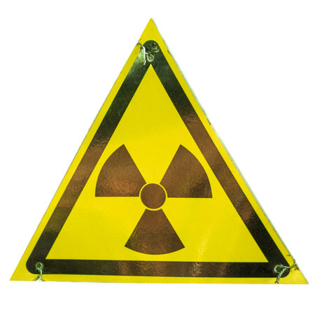 Close-up of the yellow triangular radiation sign. isolated on a white background. Warning of dangerの写真素材