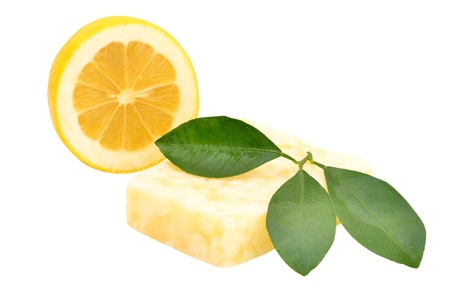Handmade citrus soap with lemon and leaf isolated on white backgroundの写真素材
