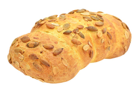 Corn bread with pumpkin seeds isolated on white background