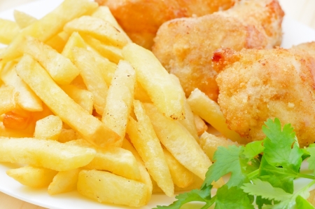 Fried chicken with french fries, close up viewの写真素材