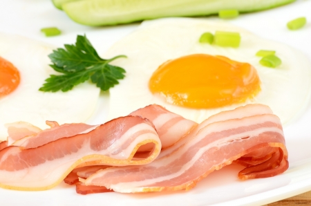 Breakfast with bacon and  fried eggsの写真素材