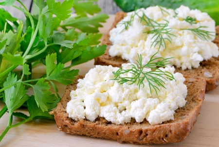 Sandwiches with curd cheese and herbsの写真素材