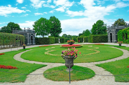 VIENNA, AUSTRIA -JULY 31: Garden of Schonbrunn Palace on July 31, 2013 in Vienna, Austria.  It was listed as a UNESCO World Heritage Site in 1996.のeditorial素材