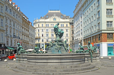 VIENNA, AUSTRIA - JULY 28: Donnerbrunnen fountain on July 28, 2013 in Vienna, Austria. Baroque fountain located on Neuer Markt square. The fountain was built in 1737.のeditorial素材