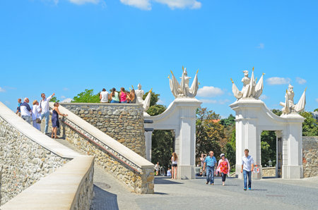 BRATISLAVA - AUGUST 1: Tourists visit the gate of Bratislava Castle on August 1, 2013 in Bratislava, Slovakia. Castle is one of the symbols of Bratislava, been built on a hill. First written reference from 907.のeditorial素材