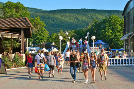 KABARDINKA, RUSSIA - JUNE 28, 2014: People are walking along embankment in Kabardinka. Kabardinka is a resort on the Black Sea Coast, Russia near Gelendzhik town.のeditorial素材
