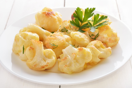 Cauliflower baked with egg and herbsの写真素材