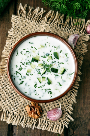 Cold soup with yogurt, cucumber and dill, top viewの写真素材