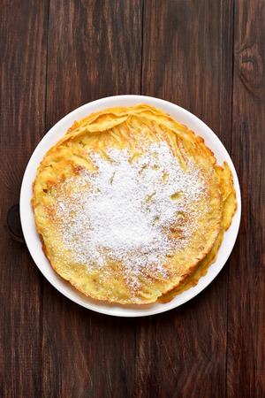 Russian pancake on wooden background, top viewの写真素材