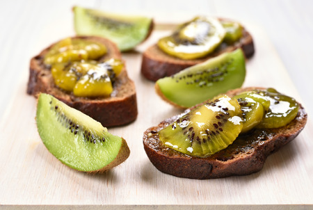 Kiwi marmalade on bread, close up viewの写真素材