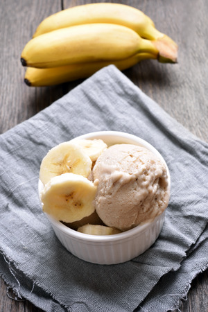 Banana ice cream in bowl, country styleの写真素材