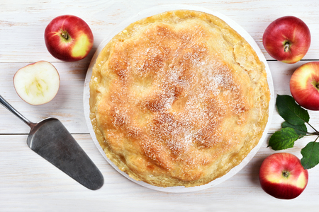 Apple pie on white wooden background, top viewの写真素材