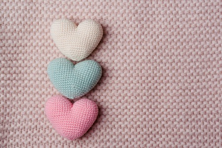 The knitted hearts Backgroundの写真素材
