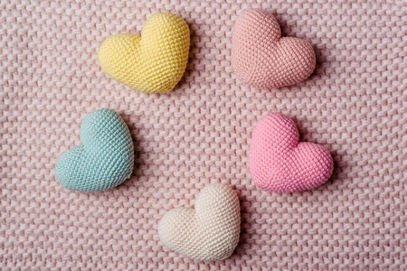 The knitted hearts Backgroundの写真素材