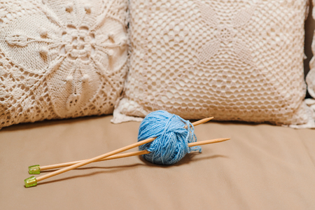 Knitting yarn balls and needles . Selective focus.の写真素材