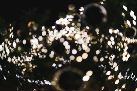 Abstract blur black bokeh backgroundの写真素材