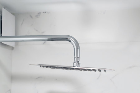New head shower in a modern bathroom, closeup. Shower head on the modern wall. Bathroom shower.の写真素材