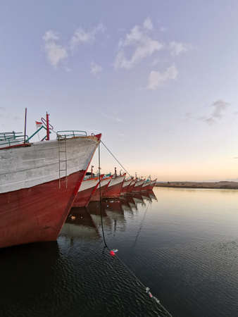 fishing boat on the harbourの写真素材