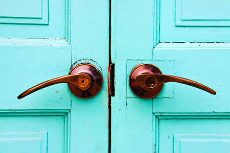 Wooden door background with handleの写真素材