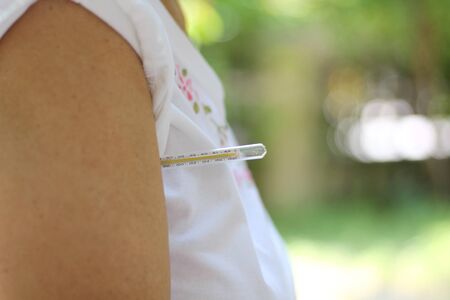Measure fever when feeling unwell.の写真素材