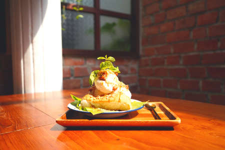 Ancient Coconut Milk Ice Cream Bread Garnish with peanuts and soybeans.の写真素材