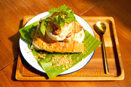Ancient Coconut Milk Ice Cream Bread Garnish with peanuts and soybeans.の写真素材
