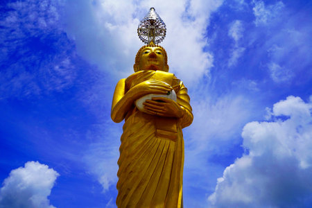 Luang Phor Ngern Lai Ma-Tema is a Buddha image holding an alms bowl (Wednesday). It represents abundance, not hungry and has the charm of kindness and popularityの写真素材