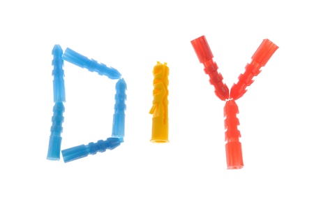 Do It Yourself abbreviation made of dowels on white backgroundの写真素材