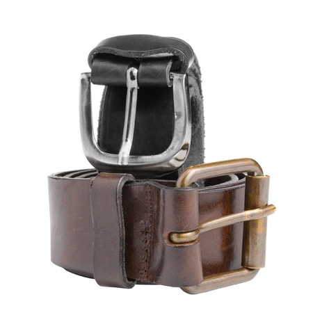 Black and brown leather belts isolated on white backgroundの写真素材