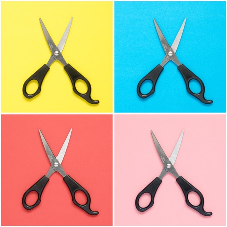 Collage of scissors on colorful paper backgroundの写真素材