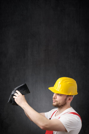 Portrait of a poor construction workerの写真素材