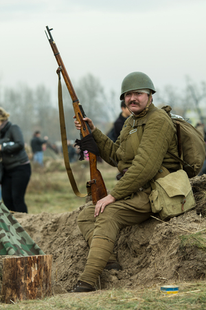 X INTERNATIONAL FESTIVAL GIVE KIEV , 03.11.13, Kiev, Ukraine. Military historical reconstruction of the crossing of Dnieper River by parts of Red Army in September-October 1943, Great Patriotic War.のeditorial素材