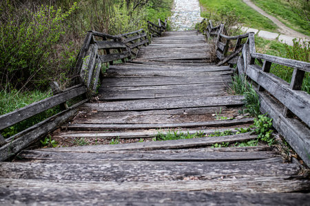 Staircase of a wooden bridge. Wooden staircase from the mountain.の写真素材