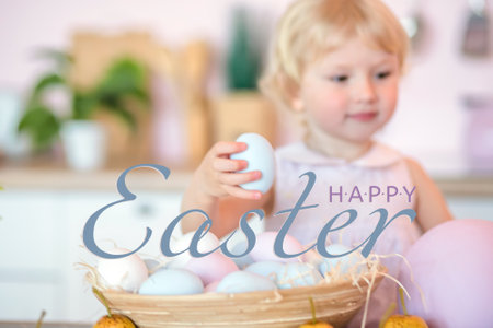 Text Happy Easter girl takes out a blue Easter egg from a basket with colorful eggs on Easter day. defocused.の写真素材