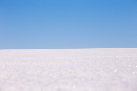 Tourists Riding Snowmobiles Through Thick Snow In Finland During Winter - aerial shotの写真素材