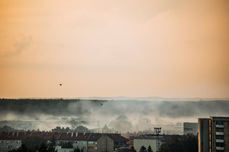 Sunrise mosquito fogging over Osijek cityの写真素材