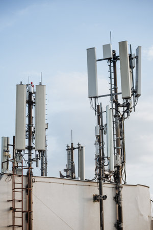 Rooftop communication towers with antennasの写真素材