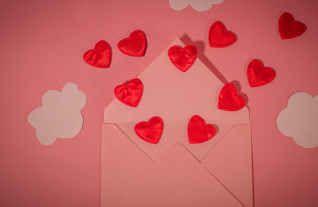 Red hearts and pink envelope for Valentine Day