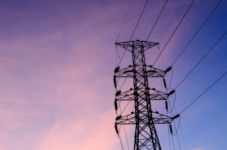 electricity post and sunset of thailandの写真素材