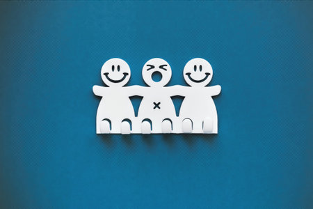 Happy and sad smiles. White Plastic figures on blue background.