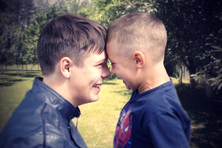 Happy brothers enjoyed the sun and summerの写真素材