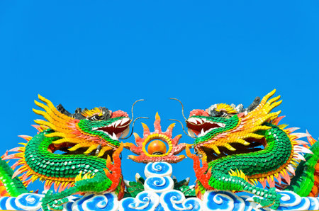 twin chinese dragon in blue sky