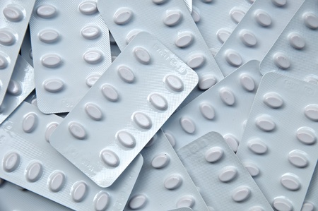 close up top view of random small tablet white packageの写真素材