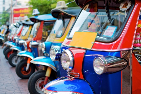 thailand native taxi call  tuk-tuk  park in rowの写真素材