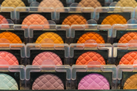 various color of face make-up powder display in closeup rowの写真素材